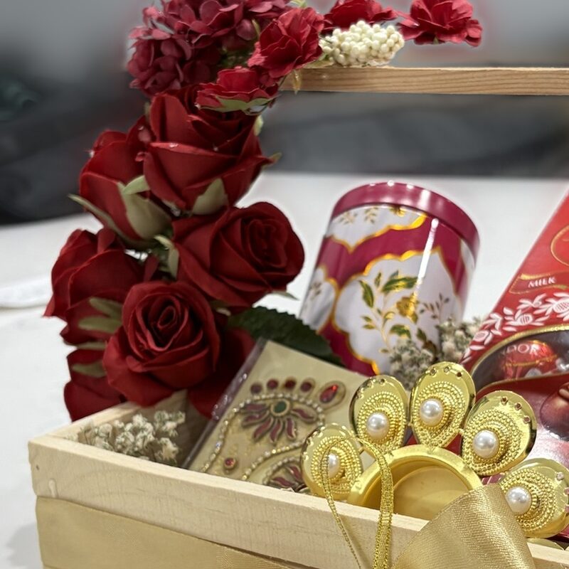 Close-up of roses and almond jar